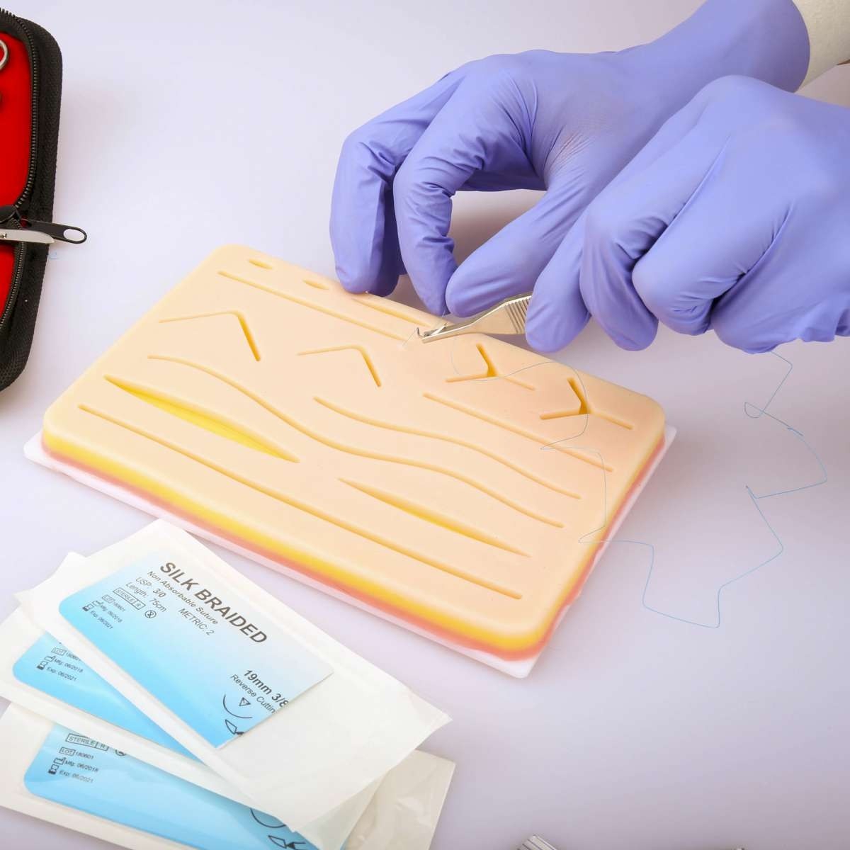 Kit de pratique de suture pour étudiants en médecine, générateurs de  formation avec coussin de peau, ensemble d'outils de modèle, équipement dos